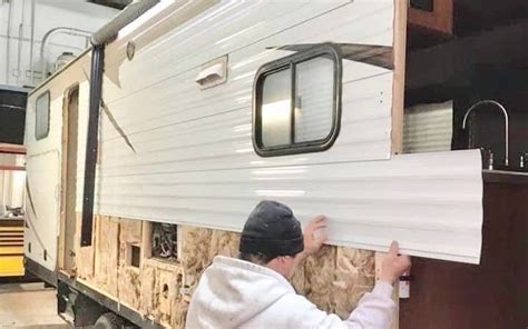 how to attach vinyl fabric to aluminum trailer wall|hanging on rv walls.